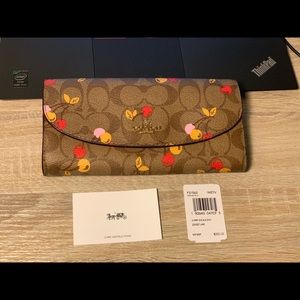 SLIM ENVELOPE WALLET IN SIGNATURE CANVAS